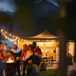People gathered around a Fireplace
